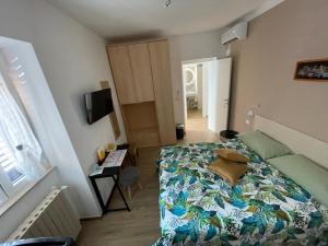Postel nebo postele na pokoji v ubytování Caramel House & Villa