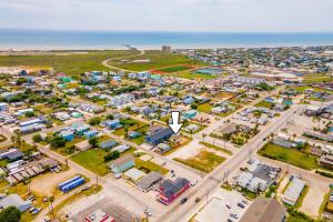 an aerial view of a city with a parking lot at Alister House in Port Aransas