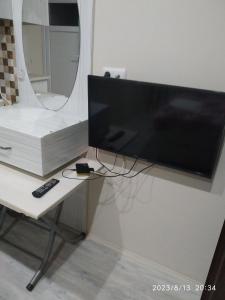 En tv och/eller ett underhållningssystem på Private home !