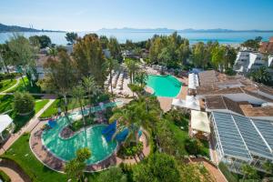 an aerial view of a resort with a swimming pool at Iberostar Ciudad Blanca in Port d'Alcudia