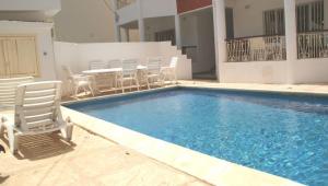 Swimmingpoolen hos eller tæt på Hotel Le Littoral Des Almadies