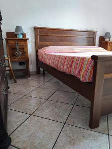 Łóżko lub łóżka w pokoju w obiekcie Casa vacanze a Macra