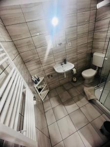 A bathroom at Milan Apartman