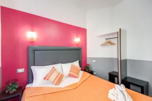Postel nebo postele na pokoji v ubytování MF Hotel