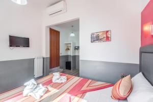 TV a/nebo společenská místnost v ubytování MF Hotel