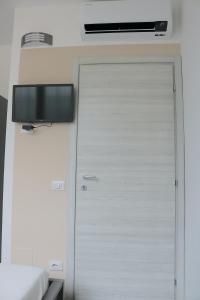 TV a/nebo společenská místnost v ubytování Gambara GuestS House + 24 fotografií