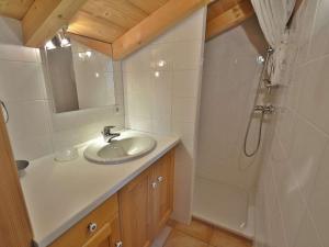 a bathroom with a sink and a shower at Chalet Le Grand-Bornand, 7 pièces, 10 personnes - FR-1-391-19 in Le Grand-Bornand