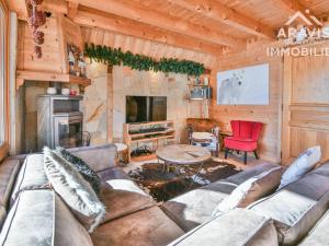 Chalet Le Grand-Bornand, 5 pièces, 9 personnes - FR-1-391-35にあるシーティングエリア