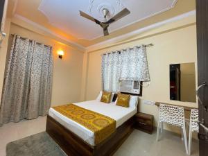 Säng eller sängar i ett rum på Visit Kashi Stay