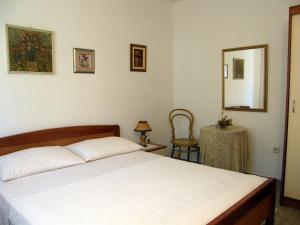 Giường trong phòng chung tại Apartments Mandić