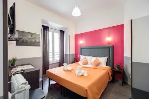 Postel nebo postele na pokoji v ubytování MF Hotel