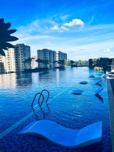 a view of a large body of water with buildings at Sentral Serviced Suites Kuala Lumpur in Kuala Lumpur