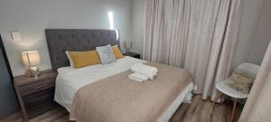 מיטה או מיטות בחדר ב-Le grand Hideout