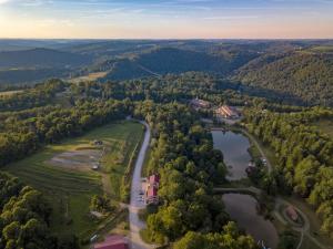 an aerial view of a river and forests at Giriraja Ashraya in Moundsville