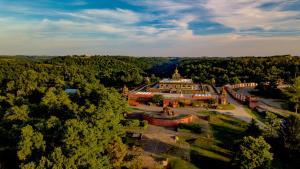 an aerial view of a building in a forest at Giriraja Ashraya in Moundsville