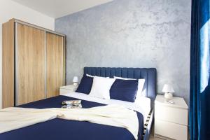 Un ou plusieurs lits dans un hébergement de l'établissement Villa Angie with Heated Pool
