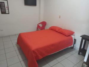 Postel nebo postele na pokoji v ubytování HOTEL Cabinas JACOMAR