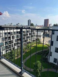 a view from a balcony of a building at Bratislava Centrum, Ahoj park apartments, 6floor with balcony in Koliba