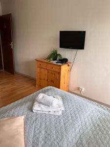 Postel nebo postele na pokoji v ubytování Gasthof Sonnenheim