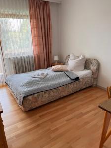 Postel nebo postele na pokoji v ubytování Gasthof Sonnenheim