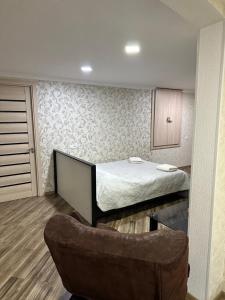 Una cama o camas en una habitación de Guest house Zuzumbo