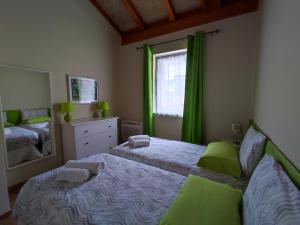 A bed or beds in a room at Villa Carmen
