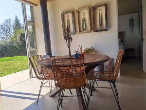 a dining room with a wooden table and chairs at Our Place-at-Notties Self-contained 2-Bed unit in Notties in Nottingham Road