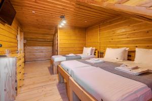 Katil atau katil-katil dalam bilik di Gremi Hotel
