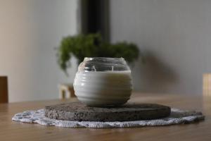 a glass jar sitting on top of a table at CEJITAS HOSTEL in Córdoba