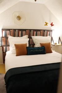 מיטה או מיטות בחדר ב-Gîte Le 16, Sous Les Trémières