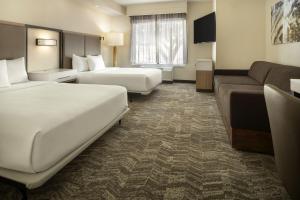 Postel nebo postele na pokoji v ubytování SpringHill Suites Fort Worth University
