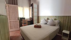Ein Bett oder Betten in einem Zimmer der Unterkunft Dormir en Cádiz