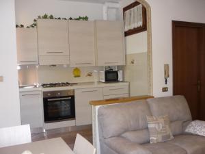 Kjøkken eller kjøkkenkrok på Serbelloni Holiday Apartment 20