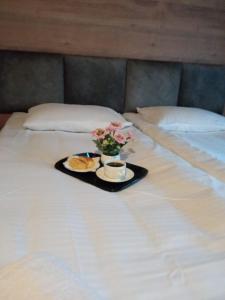 Letto o letti in una camera di Mestia Roots