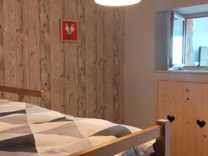Posteľ alebo postele v izbe v ubytovaní Appartement cosy avec parking, plein sud - 3 pièces, 7 Rue Jean Calvet - FR-1-580-84