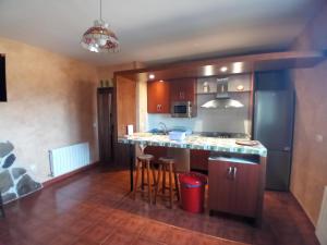 Kuchyň nebo kuchyňský kout v ubytování Casa Rural Alada