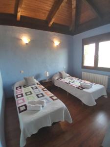 Postel nebo postele na pokoji v ubytování Casa Rural Alada
