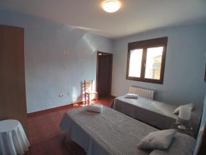 Postel nebo postele na pokoji v ubytování Casa Rural Alada