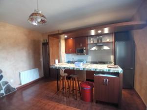 Kuchyň nebo kuchyňský kout v ubytování Casa Rural Alada