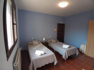 Postel nebo postele na pokoji v ubytování Casa Rural Alada