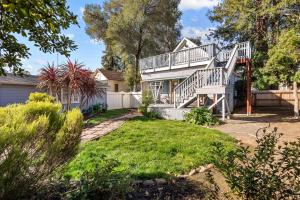 a house with a large staircase in the yard at Downtown Napa HOT TUB Retreat - 3 Bed l 2 bath in Napa