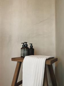 a table with two candles on top of it at Casa Otea in Ávila