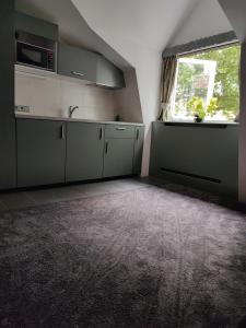 Kuchyň nebo kuchyňský kout v ubytování B&B Hotel Elselina
