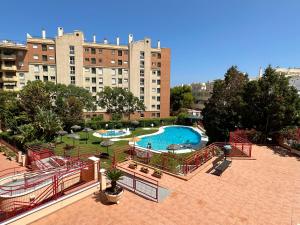 a view of a swimming pool in a city at Studio in Costa Del Sol, Sea, Sunshine & Views in Fuengirola