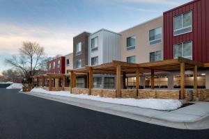 a rendering of a building with snow on the ground at Fairfield by Marriott Inn & Suites Hailey Sun Valley in Hailey