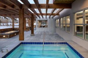 an indoor pool with a hot tub in a house at Fairfield by Marriott Inn & Suites Hailey Sun Valley in Hailey