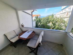 Balkón nebo terasa v ubytování Apartments in Supetarska Draga with sea view, terrace, air conditioning, WiFi 4551-1 and 4551-2