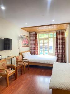 Khu vực ghế ngồi tại ROSE MOTEL