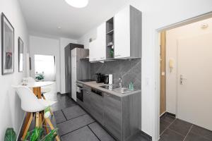 Кухня или мини-кухня в einzigartiges Apar. Prater/Messe
