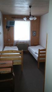 Postel nebo postele na pokoji v ubytování Hotel Nico
